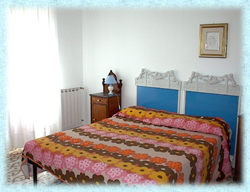 Zoom Camera da letto appartamento trilocale